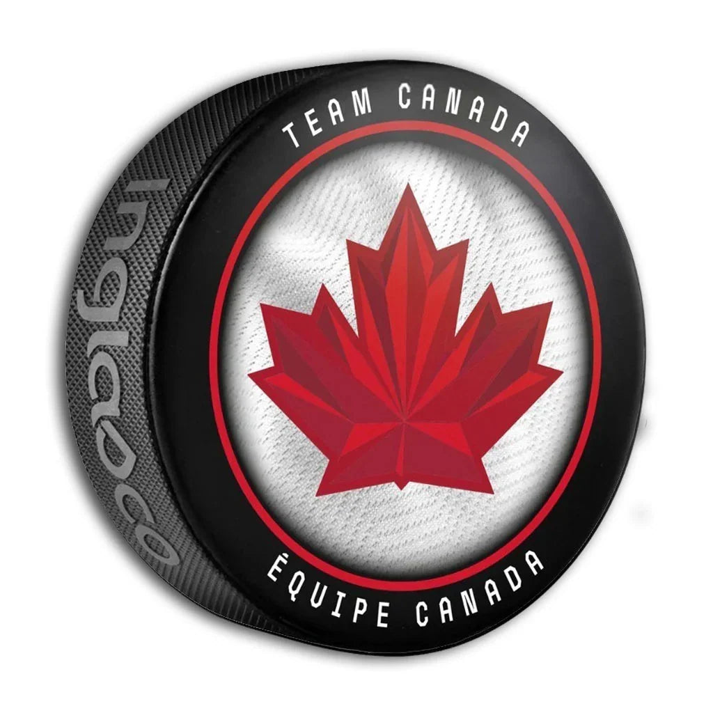 Hockey Canada IIHF Inglasco 2026 Winter Olympics Home Mesh Hockey Puck product image 1, provided for visual reference and