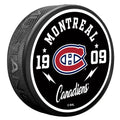 Montreal Canadiens NHL Bolt Textured Hockey Puck product image 1, provided for visual reference and product detail review