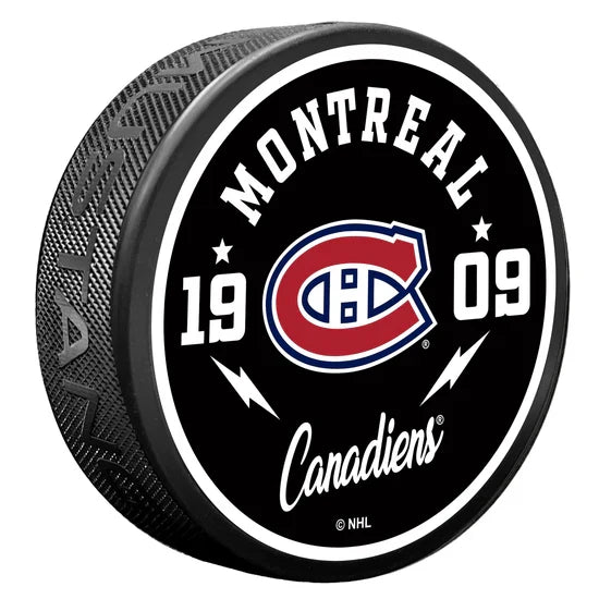 Montreal Canadiens NHL Bolt Textured Hockey Puck product image 1, provided for visual reference and product detail review
