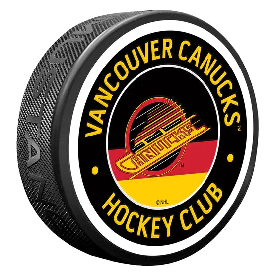 Vancouver Canucks NHL Vintage Textured Hockey Puck product image 1, provided for visual reference and product detail review