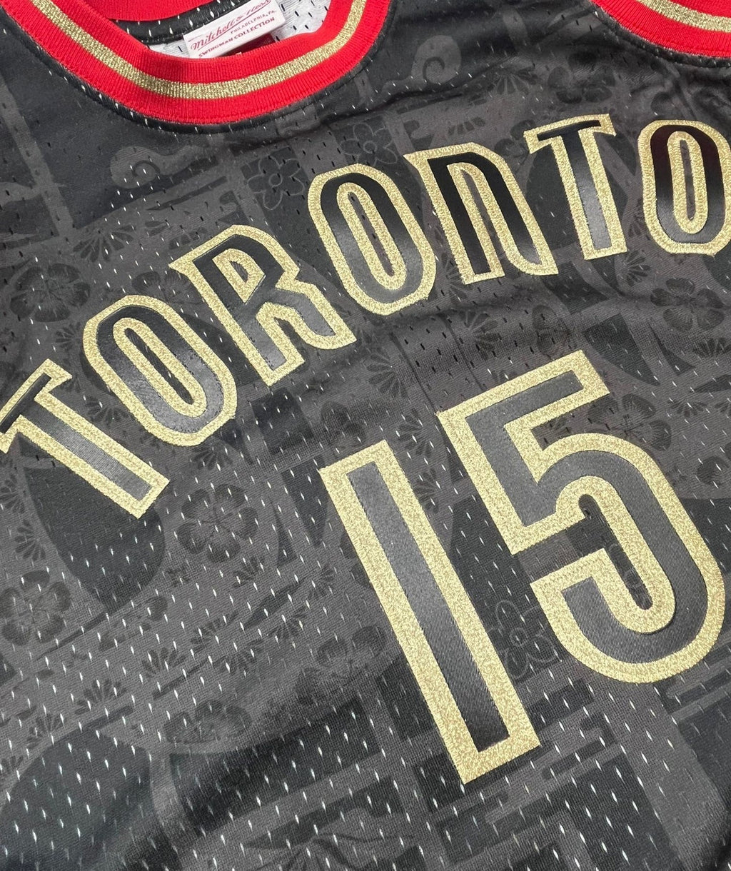 Vince Carter Toronto Raptors NBA Mitchell & Ness Men Black & Gold 1999-2000 Lunar New Year Hardwood Classics Swingman Jersey
